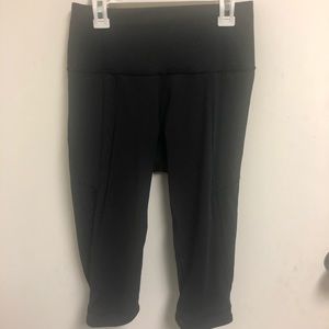 Black lululemon crop leggings with mesh inserts